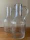 2 anciennes Verseuses / Carafes en cristal taillé et gravé d' 1 couronne