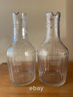 2 anciennes Verseuses / Carafes en cristal taillé et gravé d' 1 couronne