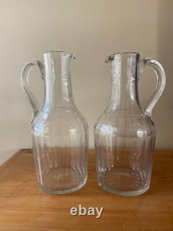 2 anciennes Verseuses / Carafes en cristal taillé et gravé d' 1 couronne