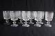 8 anciens verres &agrave; vin en verre press&eacute; moul&eacute;, d&eacute;cor m&eacute;daillon, hauteur 13.5 cm