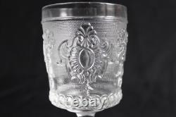 8 anciens verres à vin en verre pressé moulé, décor médaillon, hauteur 13.5 cm