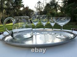 9 verres à vin anciens en cristal taillé ciselé, décor floral 9 verres à vin anciens en cristal taillé ciselé, décor floral