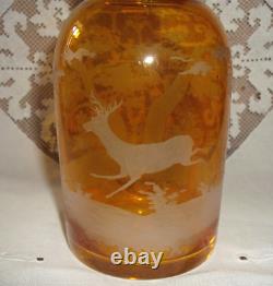 Ancien service carafe et 8 verres en cristal de bohème ambré gravés