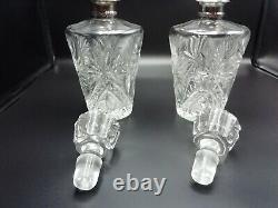 Paires de carafes anciennes en cristal et argent