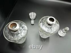 Paires de carafes anciennes en cristal et argent