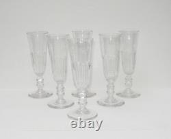 Six anciennes flûtes à champagne en cristal à pans taillés