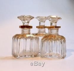 Trois flacons anciens en cristal taillé et doré XIXe siècle